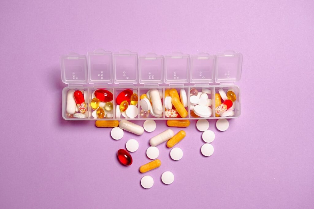 prescription medication in a weekly pill organizing box